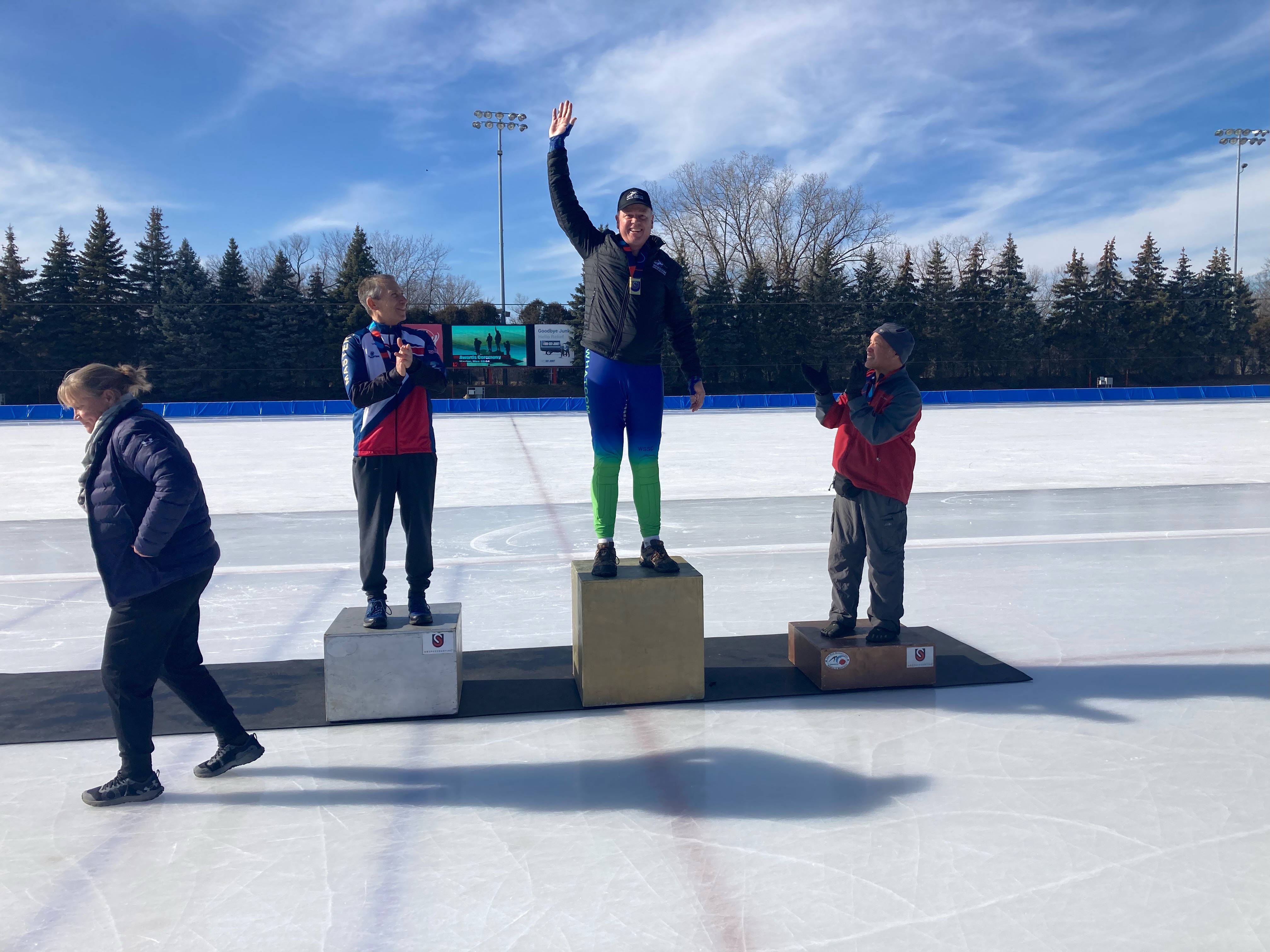 Bruce stands on the podium, having won first place